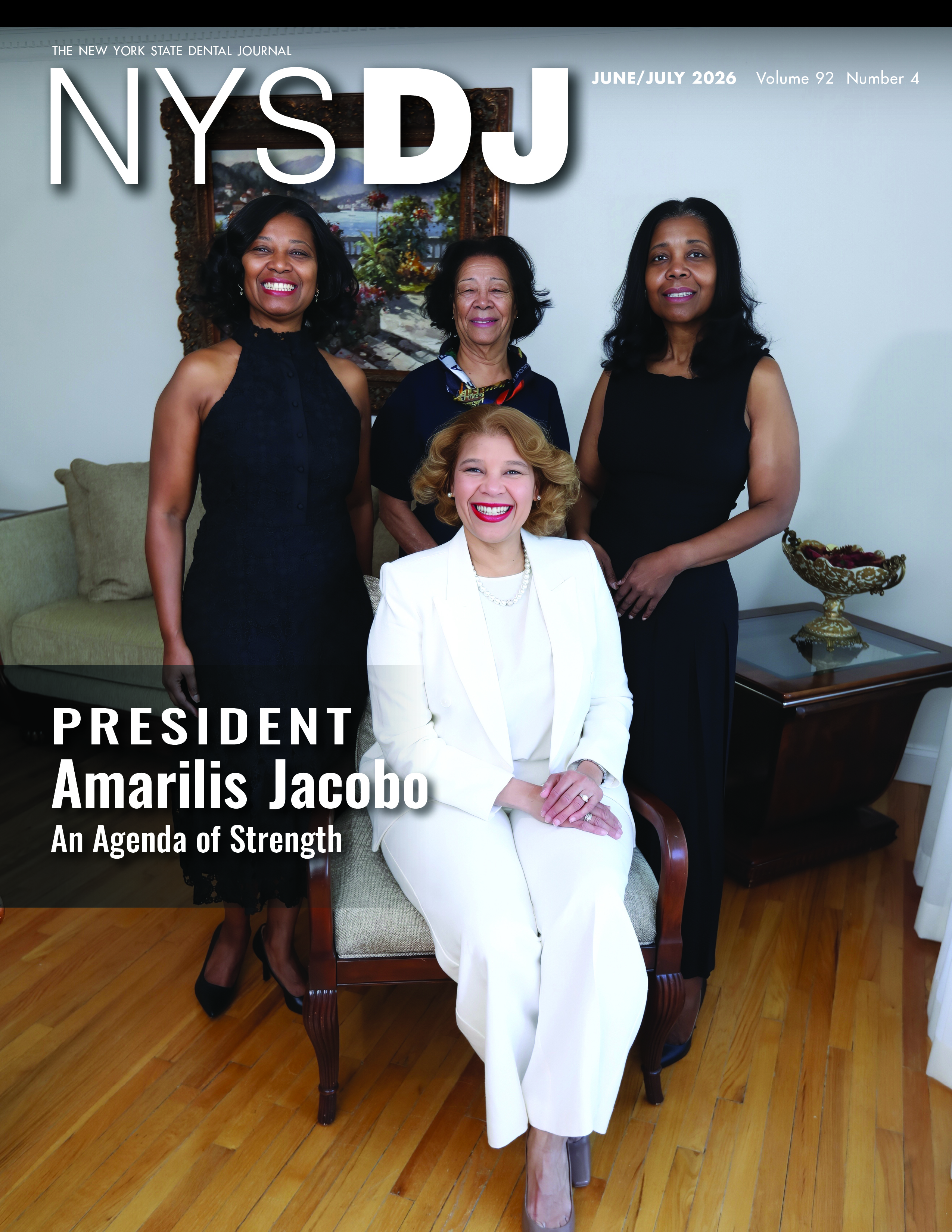 NYSDJ cover with photograph of President Amerilis Jacobo sitting with her mother and two sisters standing behind her.