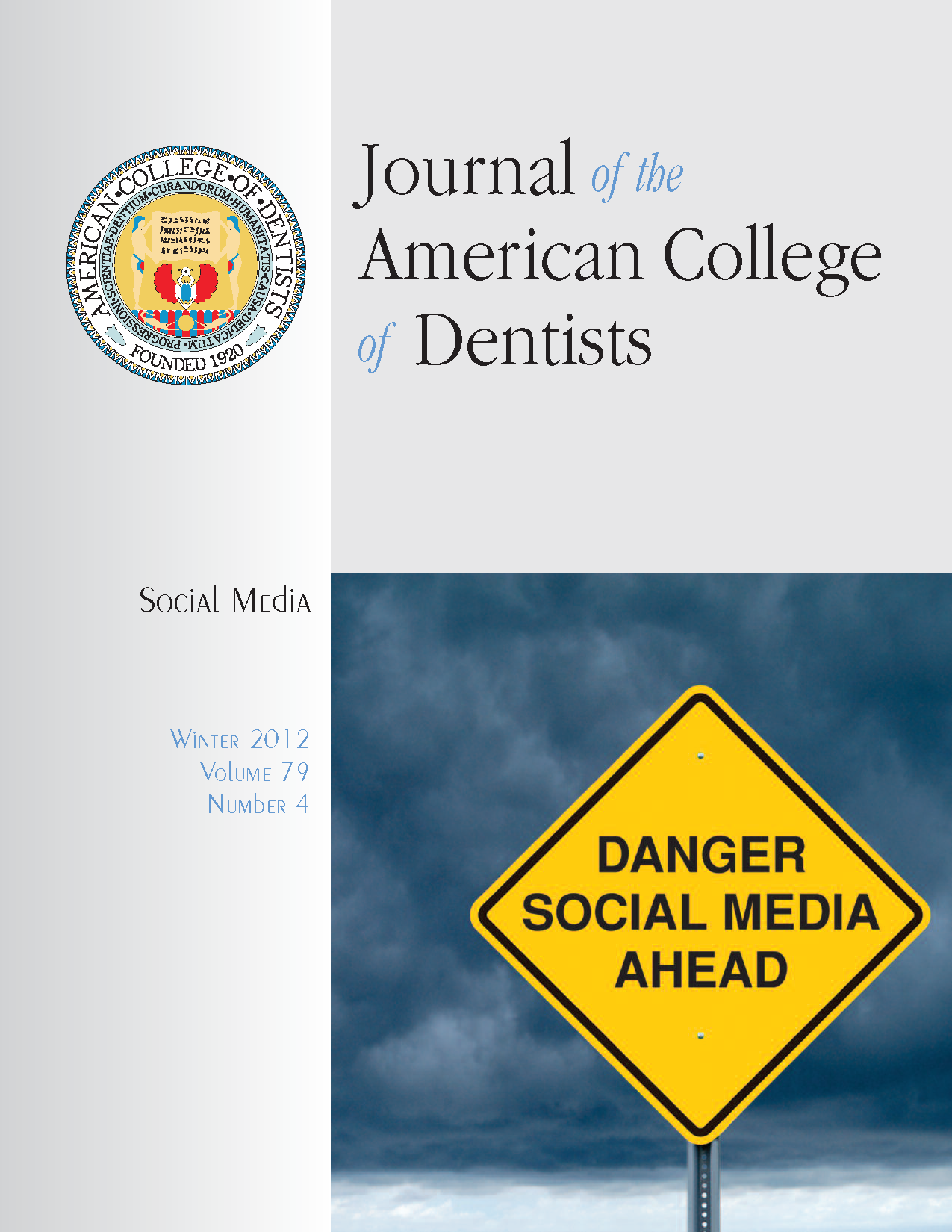 Photo of stormy sky and a hazard road sign that reads