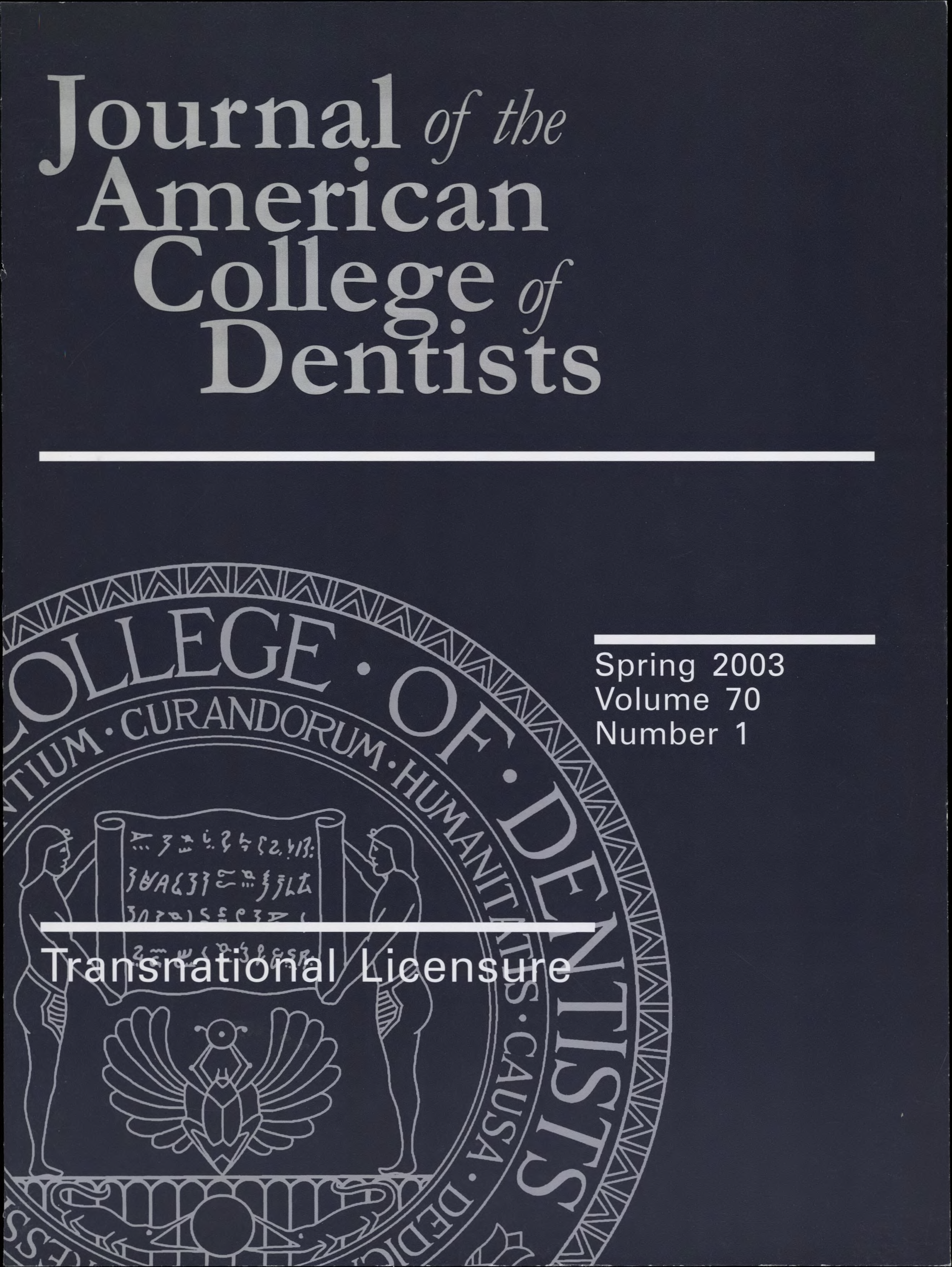 Navy blue JACD cover with the official ACD seal in the background