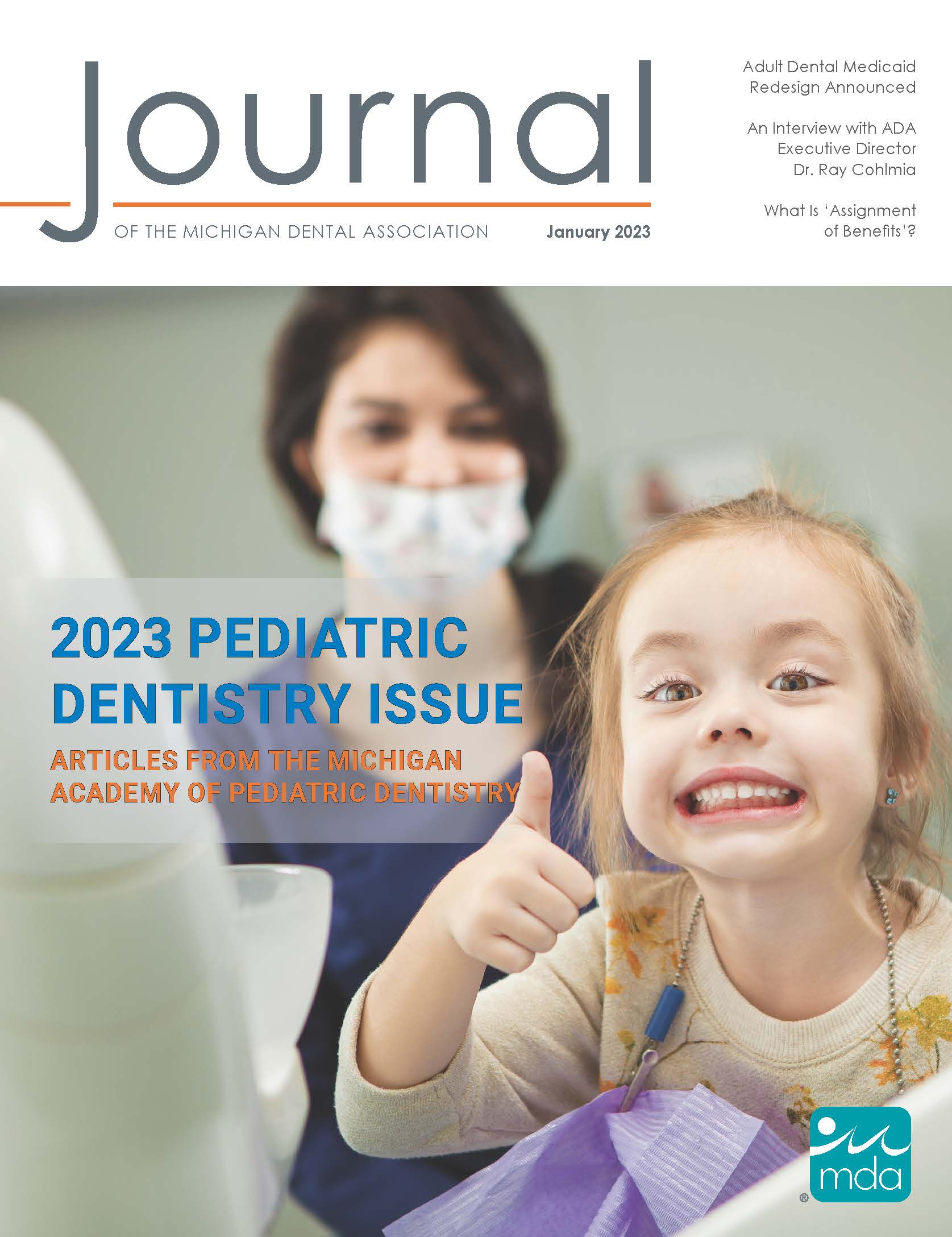 Cover of the Journal of the Michigan Dental Association featuring a small child with a dental exam bib around their neck grinning widely and giving a thumbs up. A person in scrubs with a facemask looks on in the background.