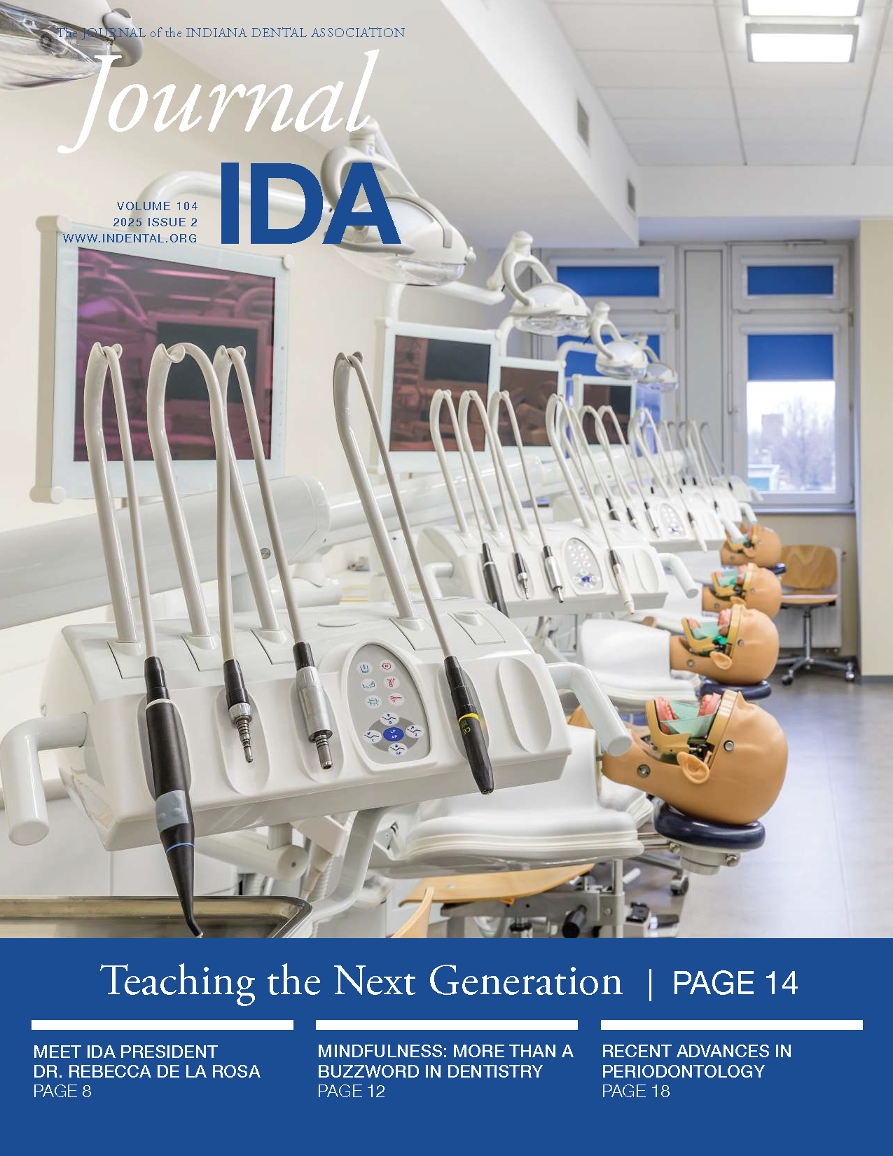Cover features a photograph of a dental training lab with training simulators.