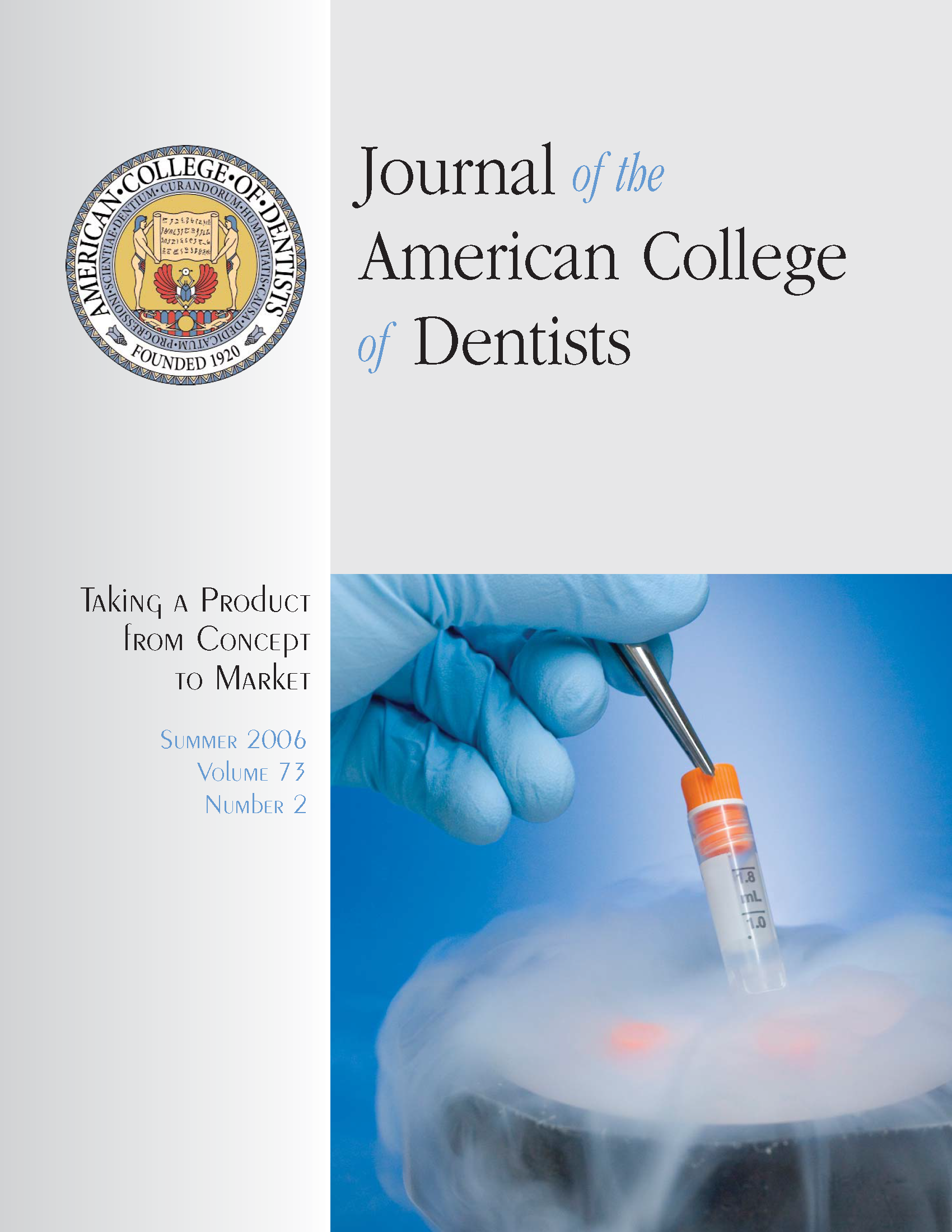 Photo of a gloved hand pulling a vial out of a foggy basin