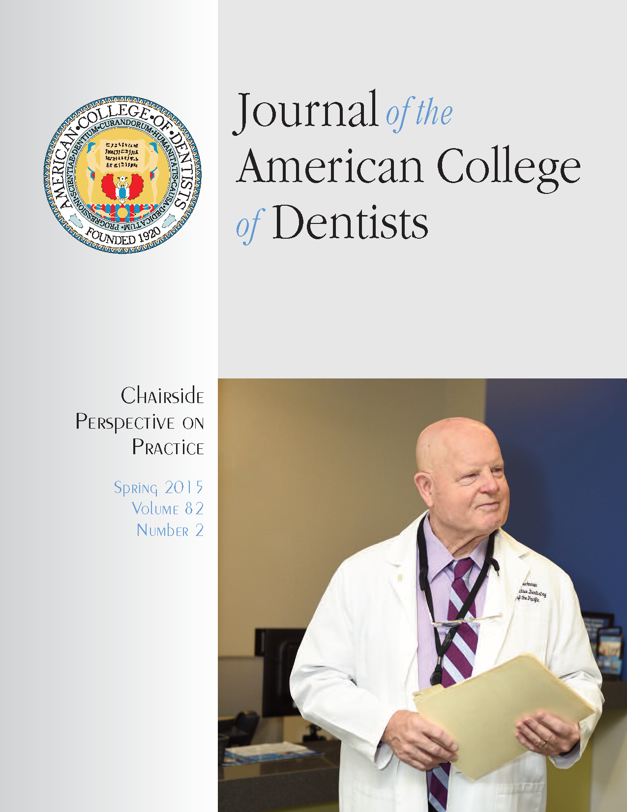 Candid photo of a dentist smiling while talking to a group