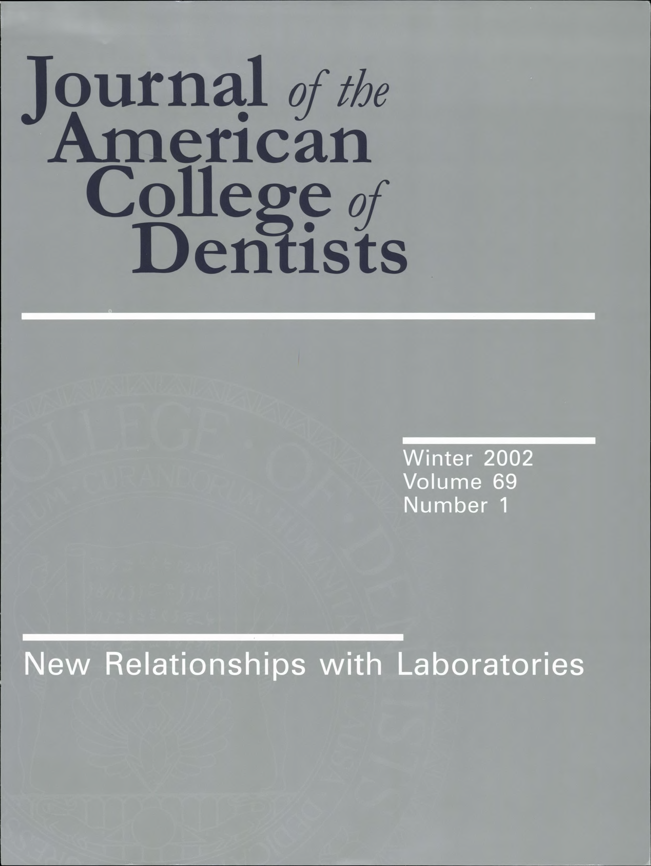 Gray JACD cover with a large white ACD seal in the background