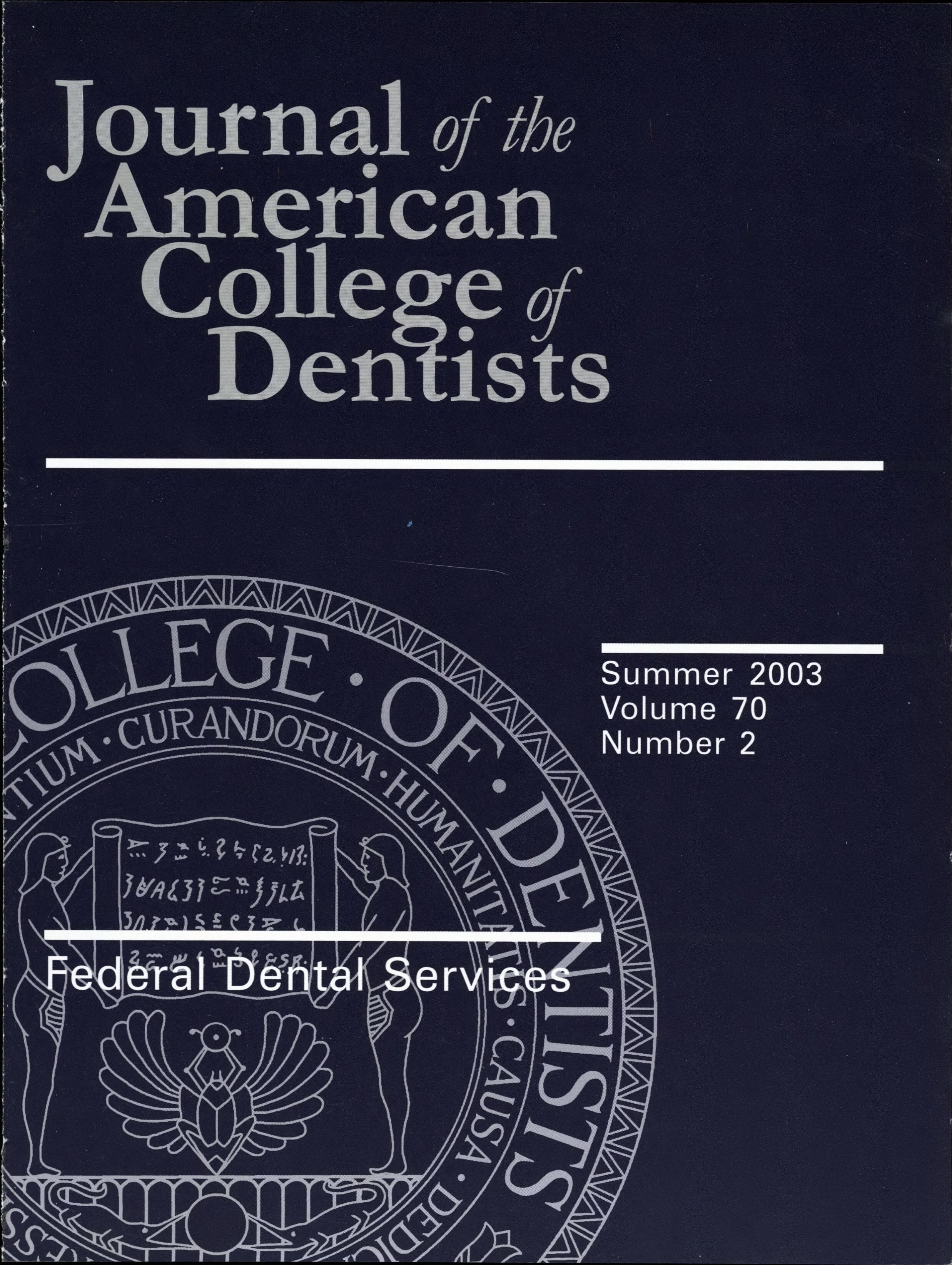 Navy blue JACD cover with the official ACD seal in the background