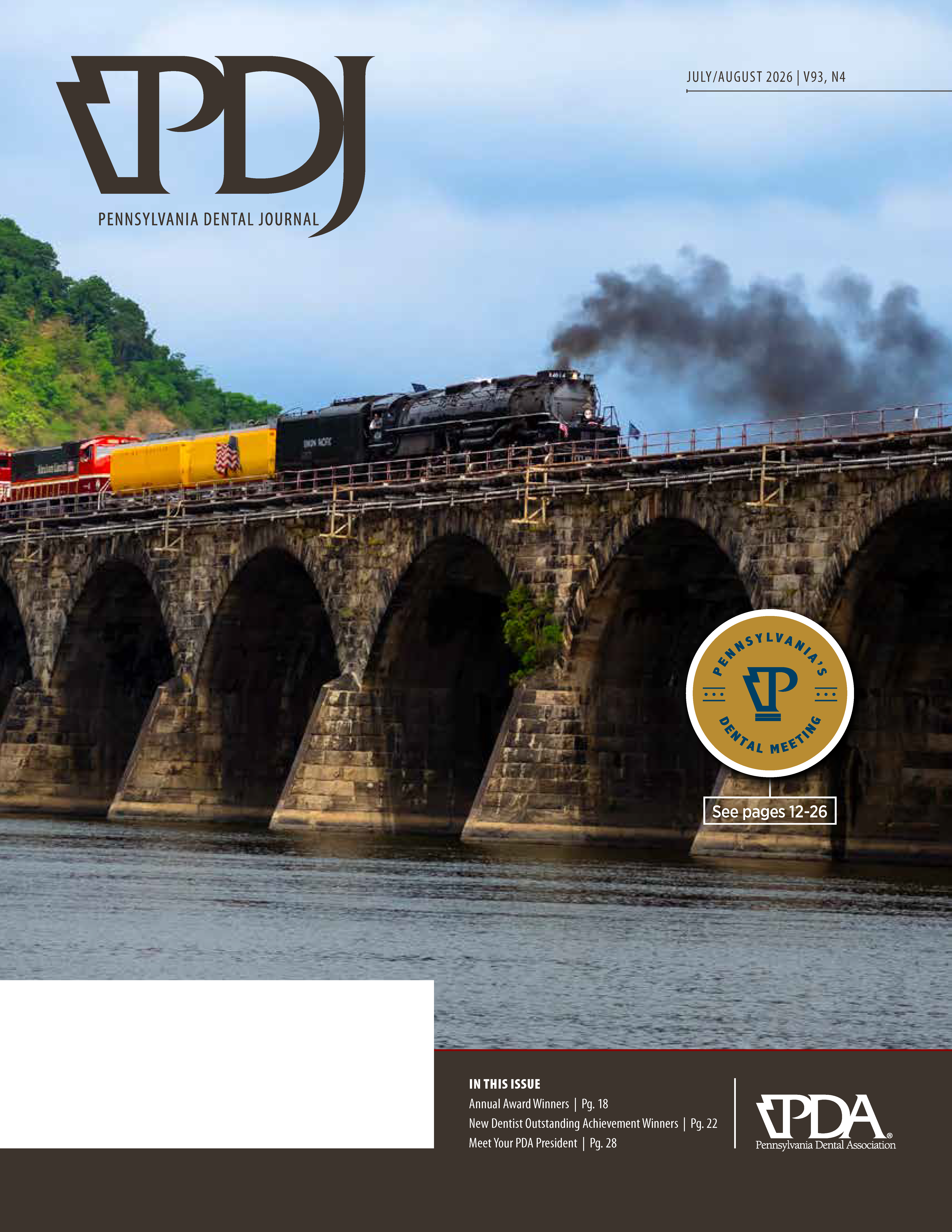 PDJ cover with a photo of a train going over a stone bridge