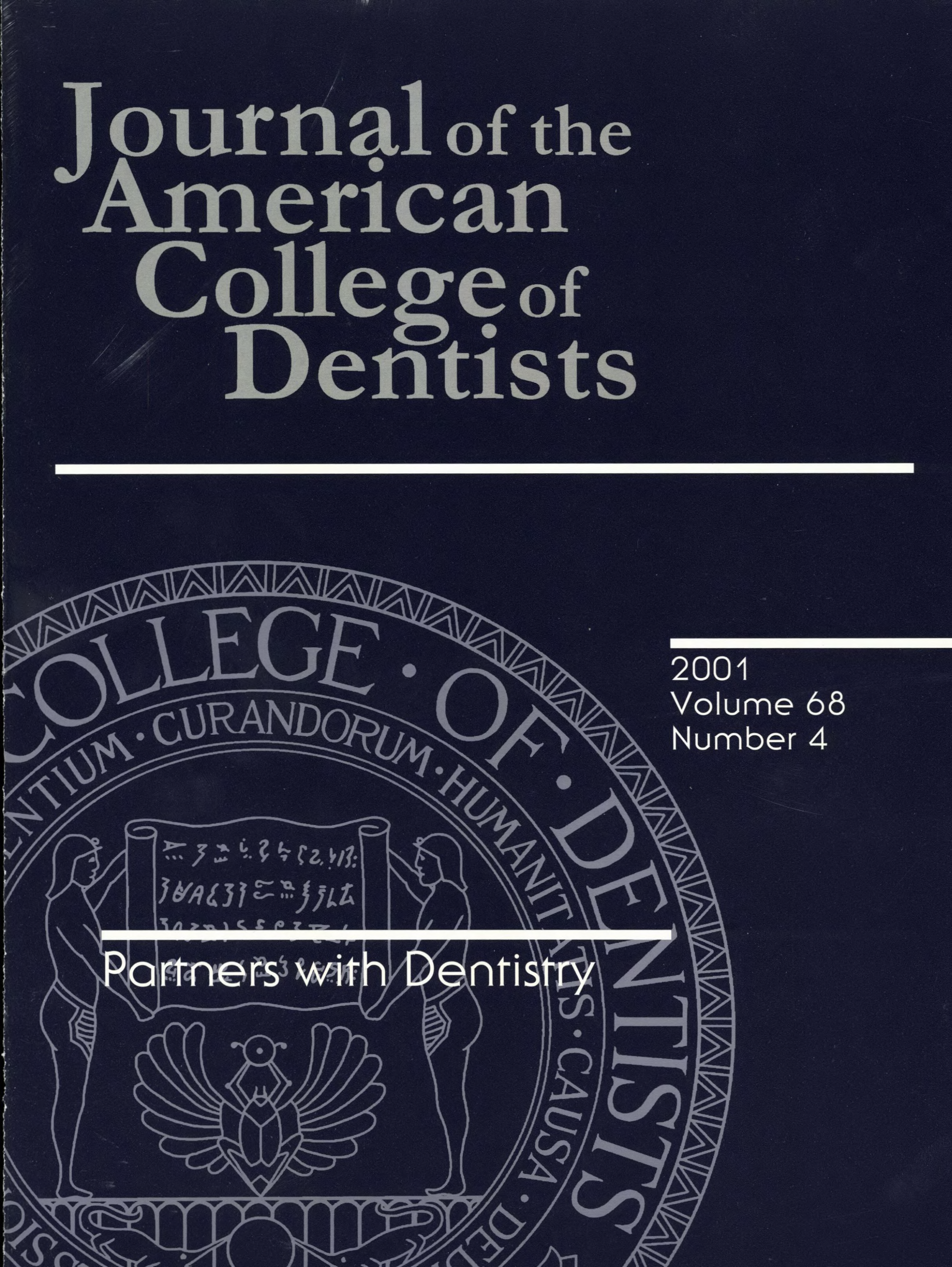 Dark blue JACD cover with a large, light gray ACD seal in the background