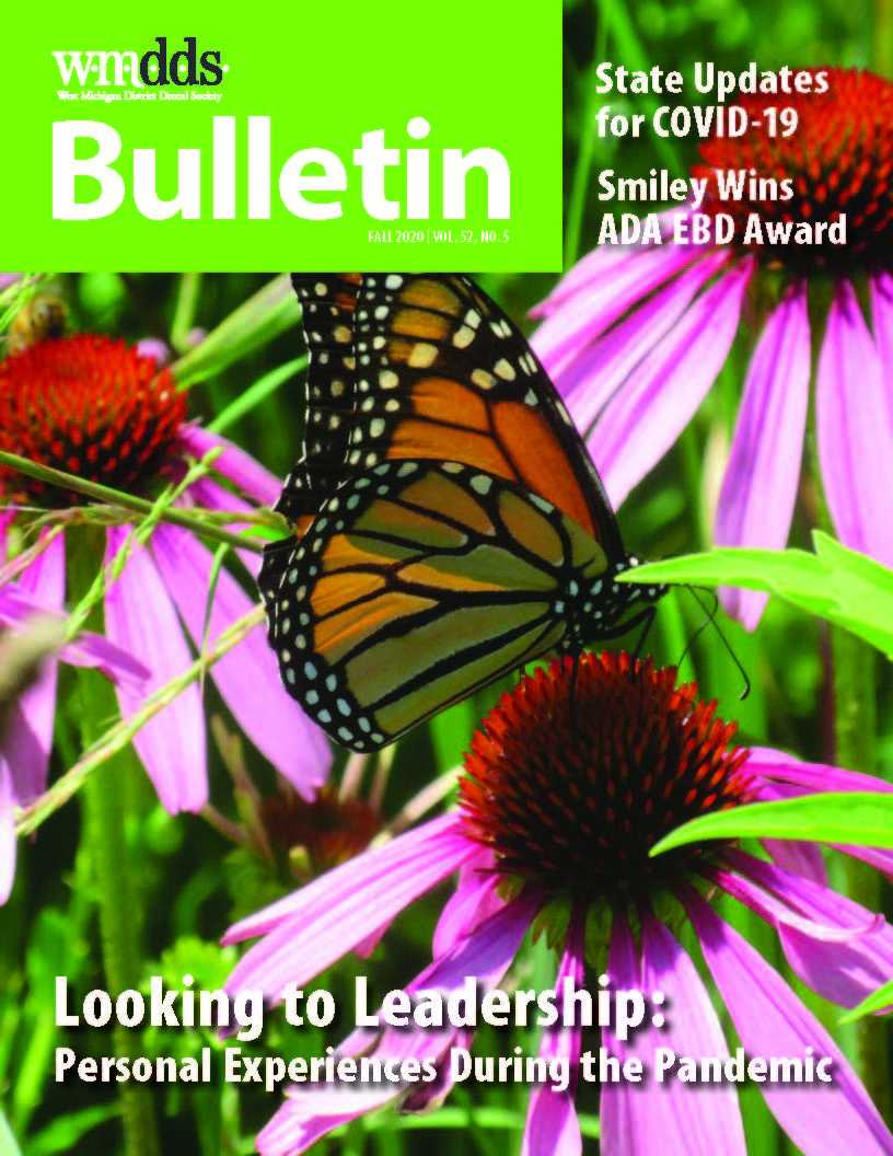 Cover of the WMDDS Bulletin featuring a photo of a monarch butterfly on a cone flower.