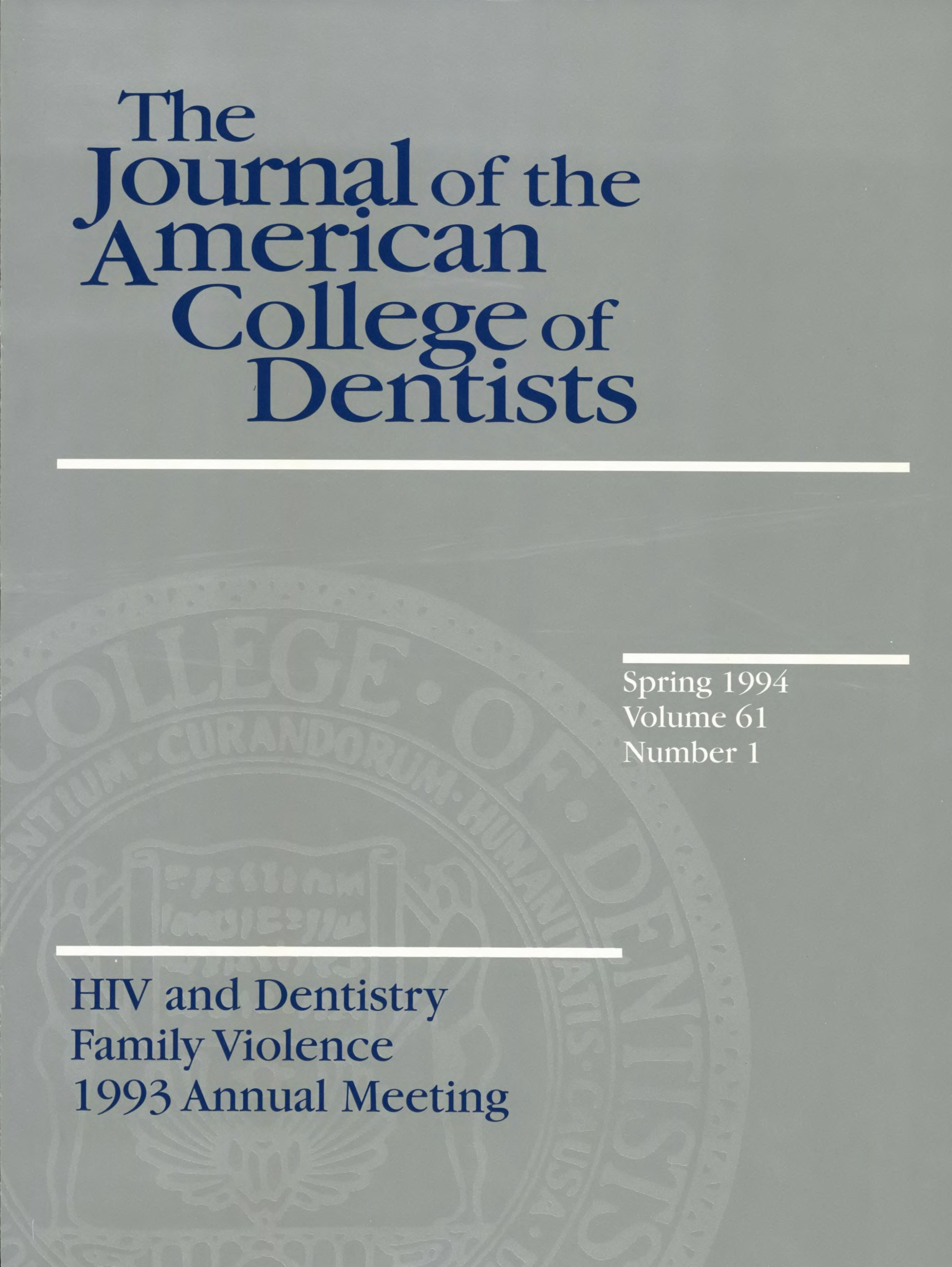 Gray JACD cover with a large, light gray ACD seal in the background