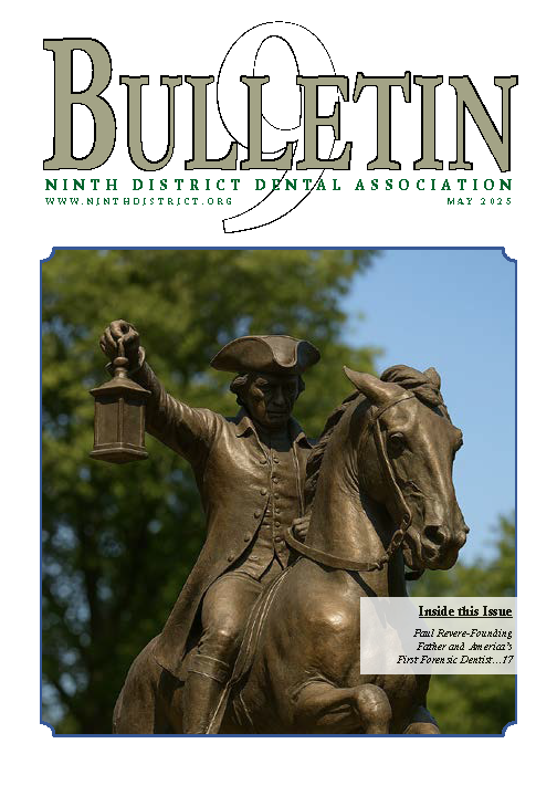 Photograph of a statue of Paul Revere. Revere is on horseback and holding a lantern.