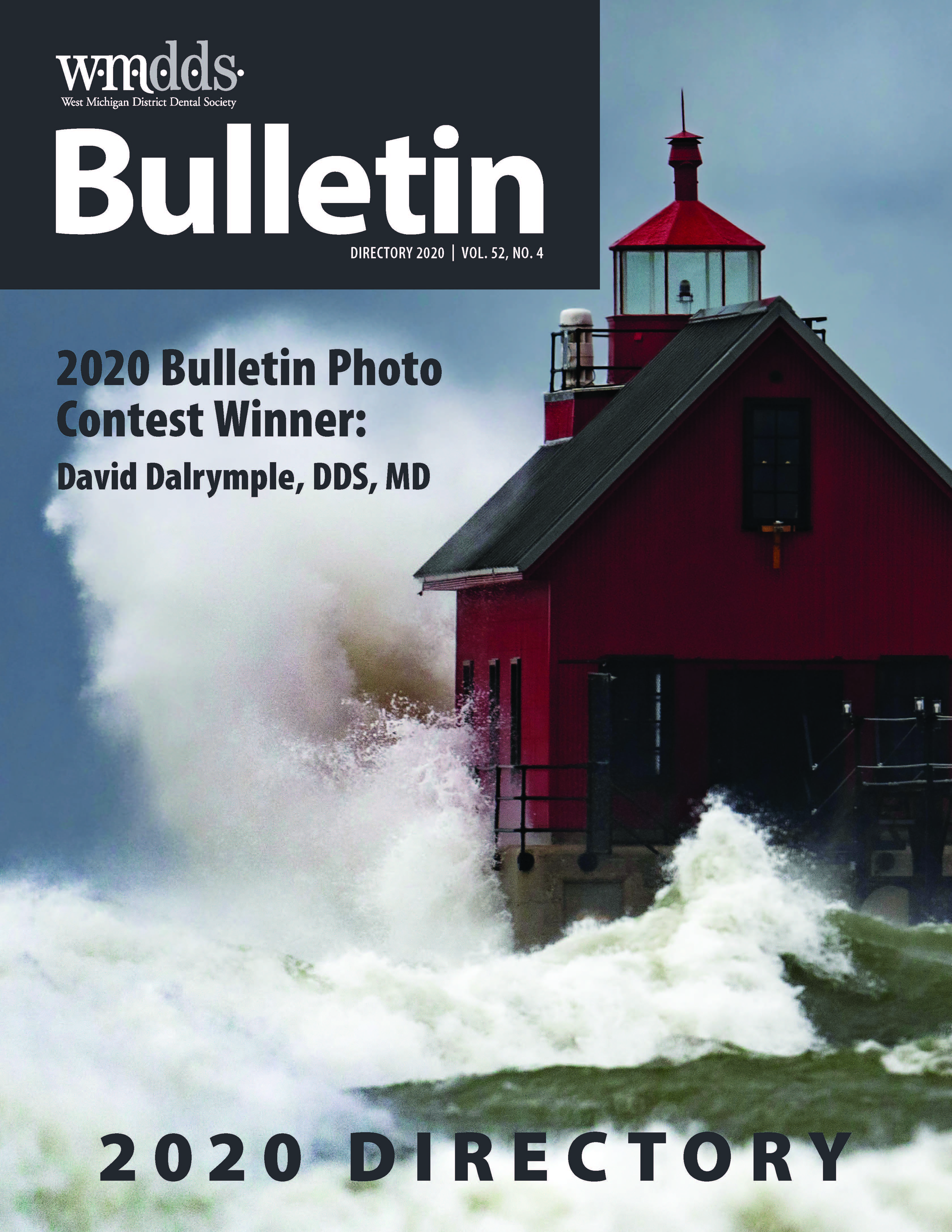 Cover of the WMDDS Bulletin with a photo of waves crashing on a red lighthouse.