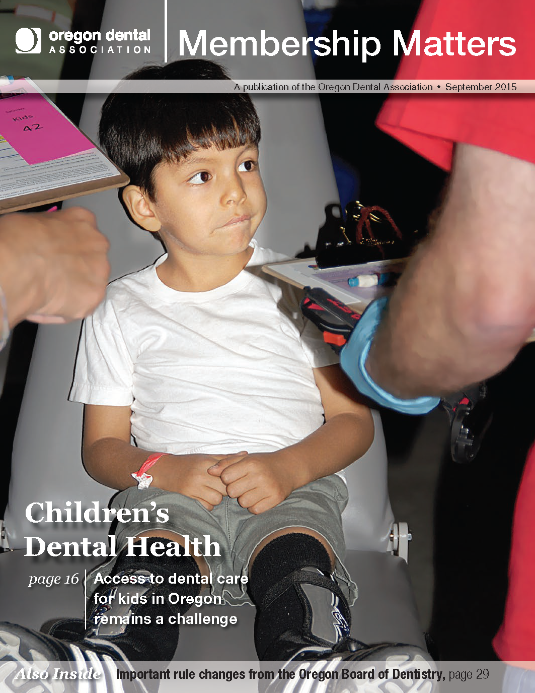 Photo of a young child being evaluated for dental care