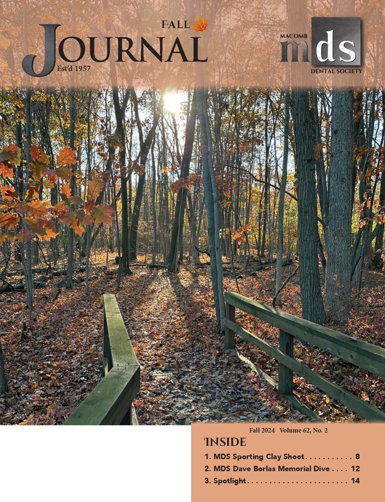 Cover of Journal of Macomb Dental Society with a photo of fall foliage and a wood bridge in Huron County Nature Center and Wilderness Arboretum