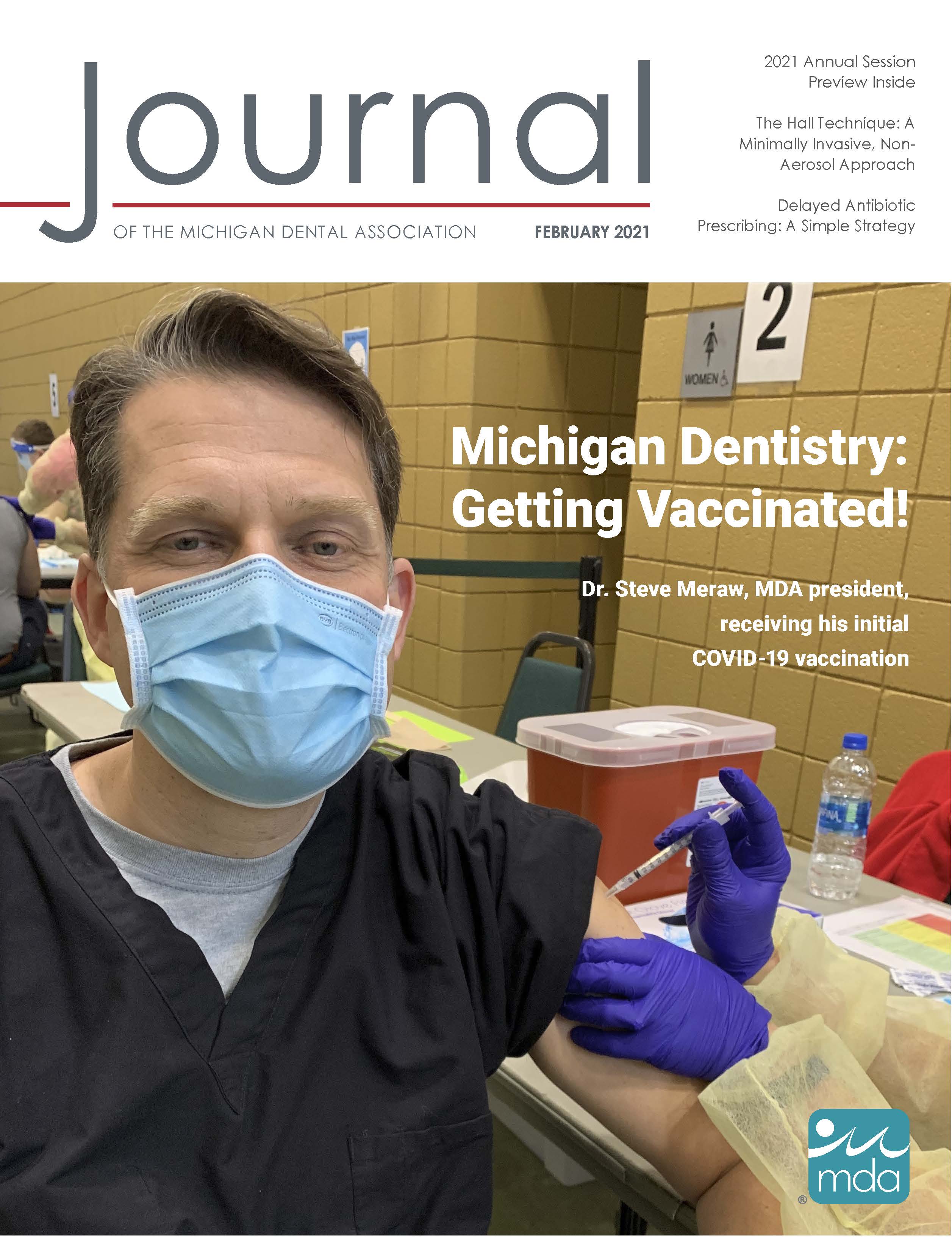 Cover of the Journal of the Michigan Dental Association with MDA President Dr. Steve  Meraw wearing a face mask and receiving the COVID-19 vaccination.