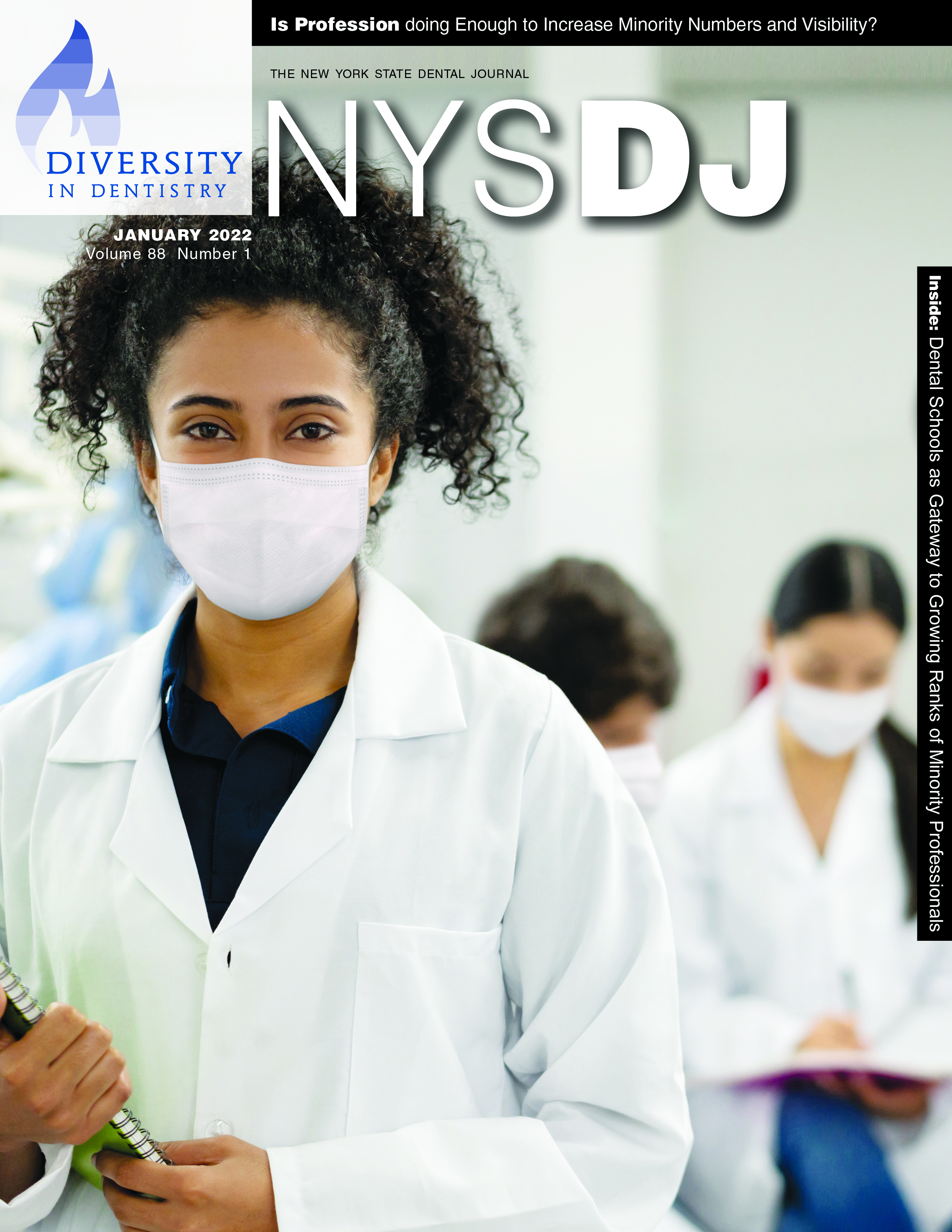 Cover of the NYSDJ with a person in a white coat with a face mask on looking at the camera.