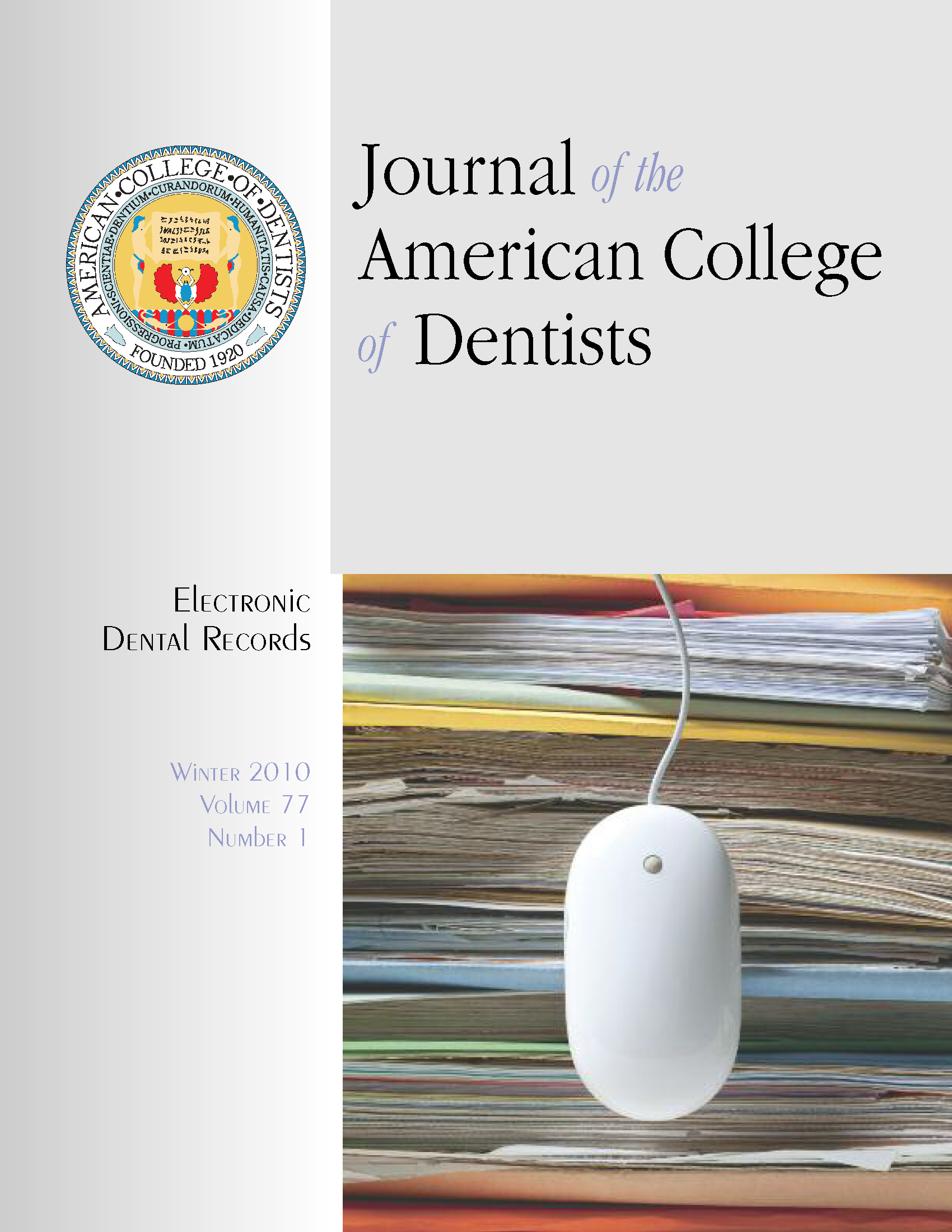 Decorative photo of wired apple mouse on paper records