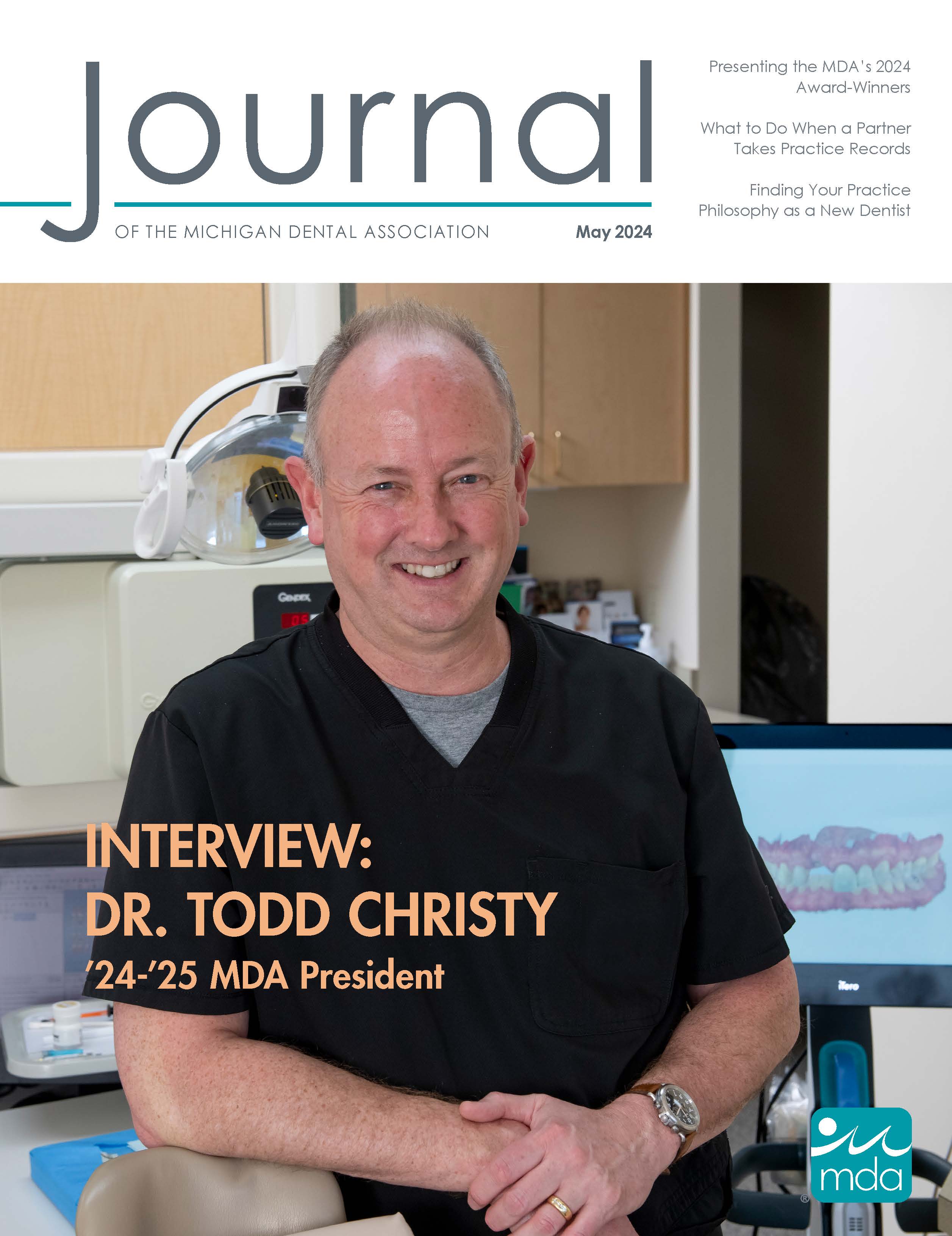 Cover of the Journal of the Michigan Dental Association with a photo of MDA President Dr. Todd Christy sitting in a dental exam chair.