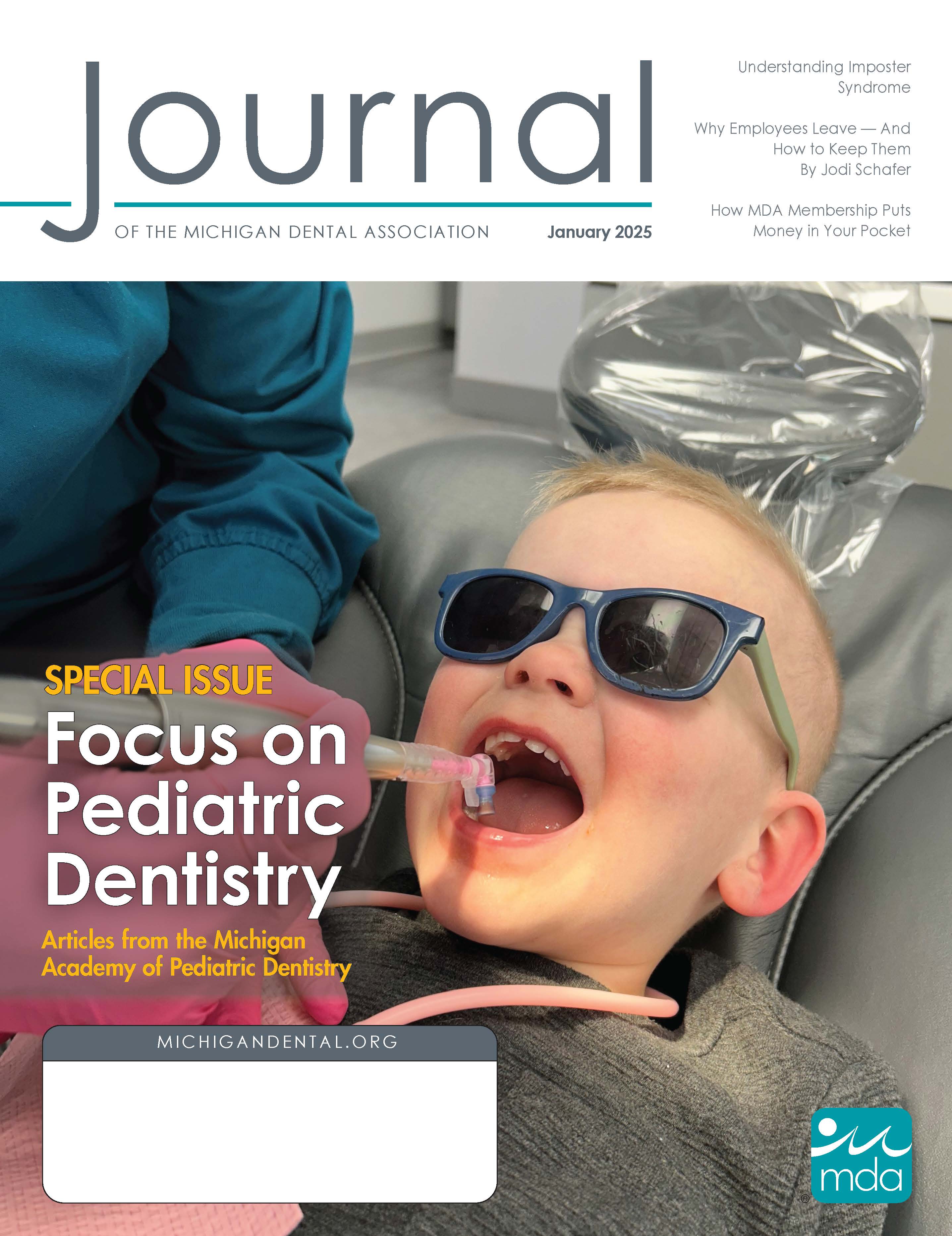 Cover of the Journal of the Michigan Dental Association with a small child wearing sunglasses and smiling during a dental cleaning