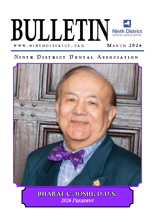 Portrait photo of Dr. Joshi. He is wearing a purple bow tie that says NYU