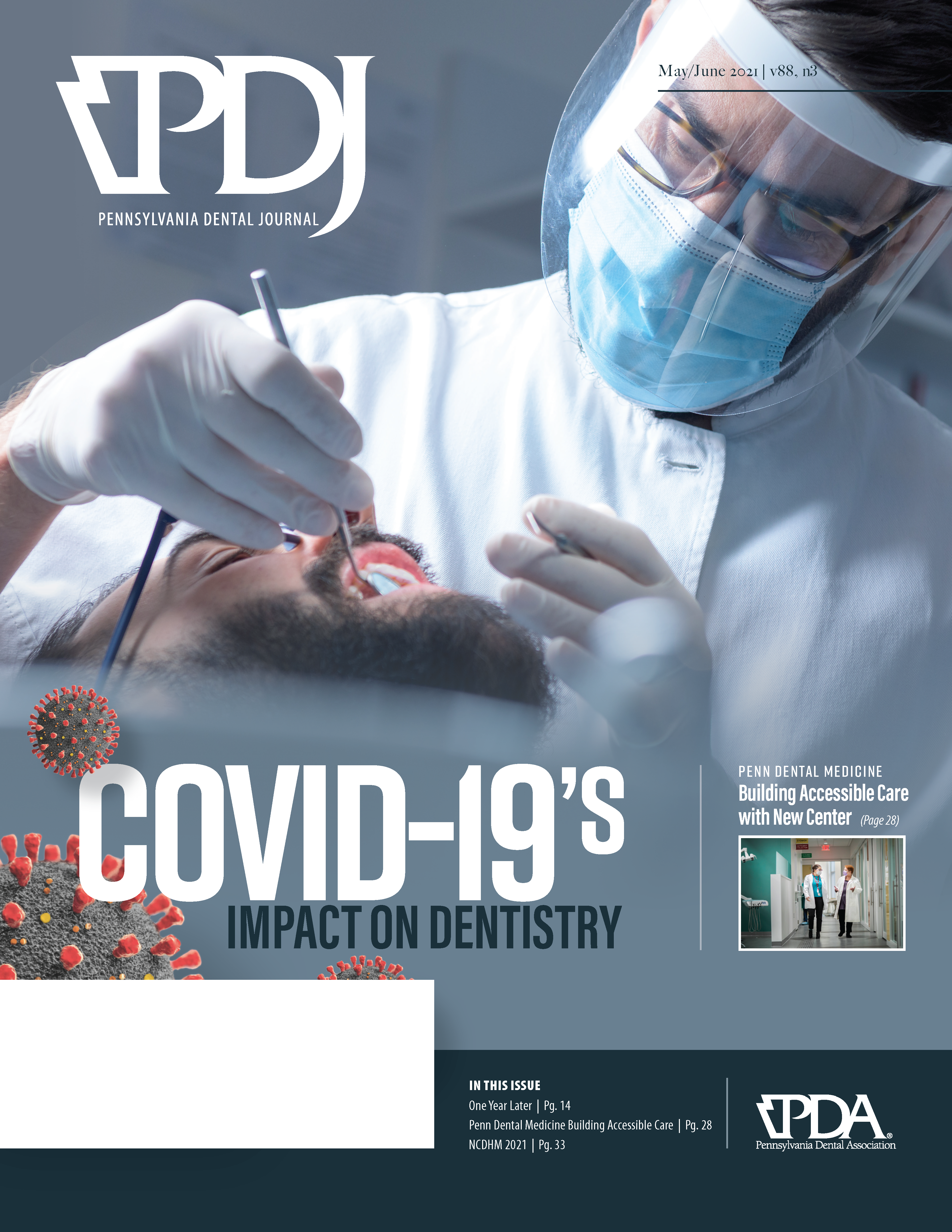 Dentist conducting dental work on patient while wearing a face shield and surgical mask designed to prevent the spread of Covid-19.