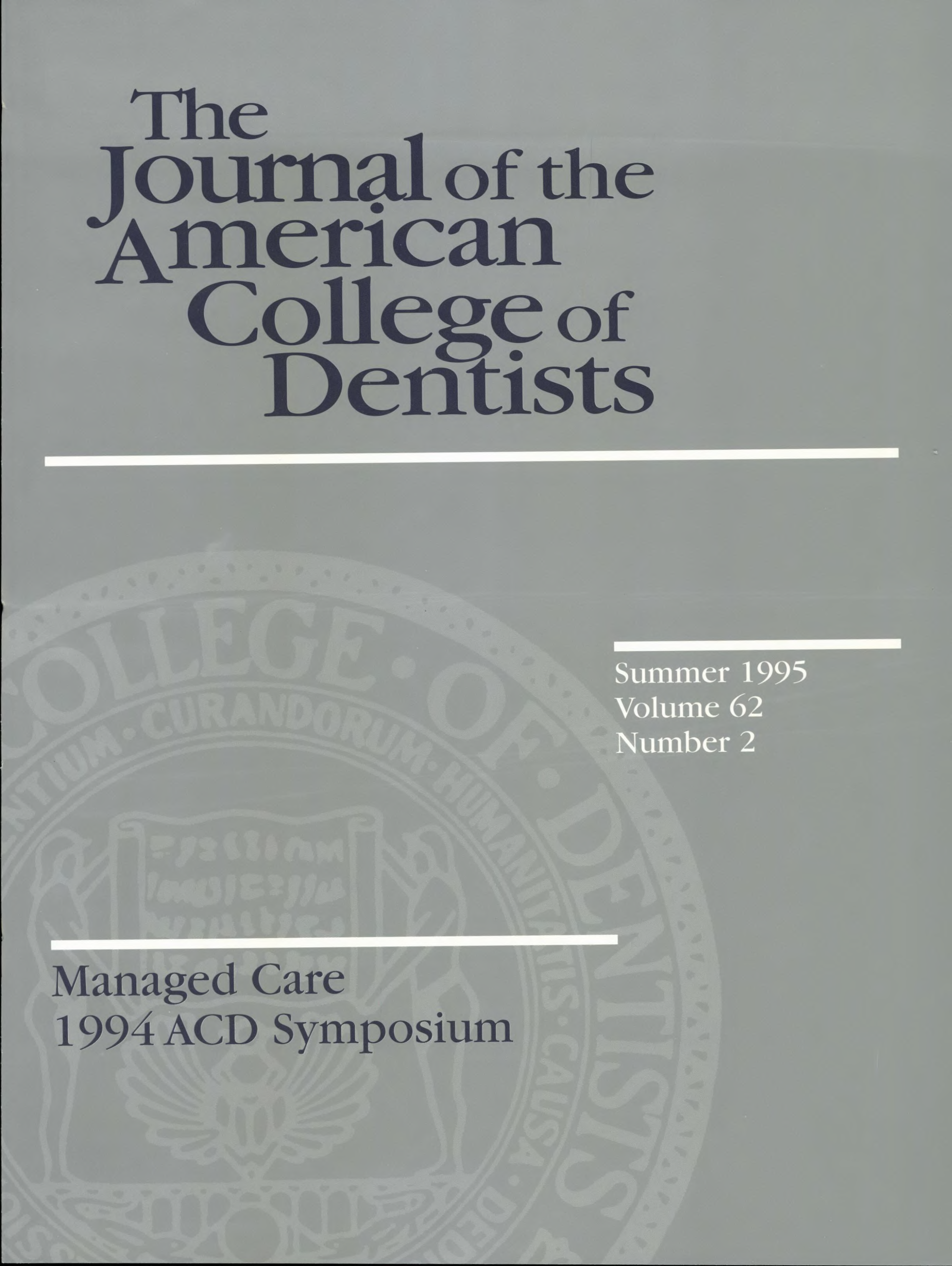 Gray JACD cover with a large, light gray ACD seal in the background