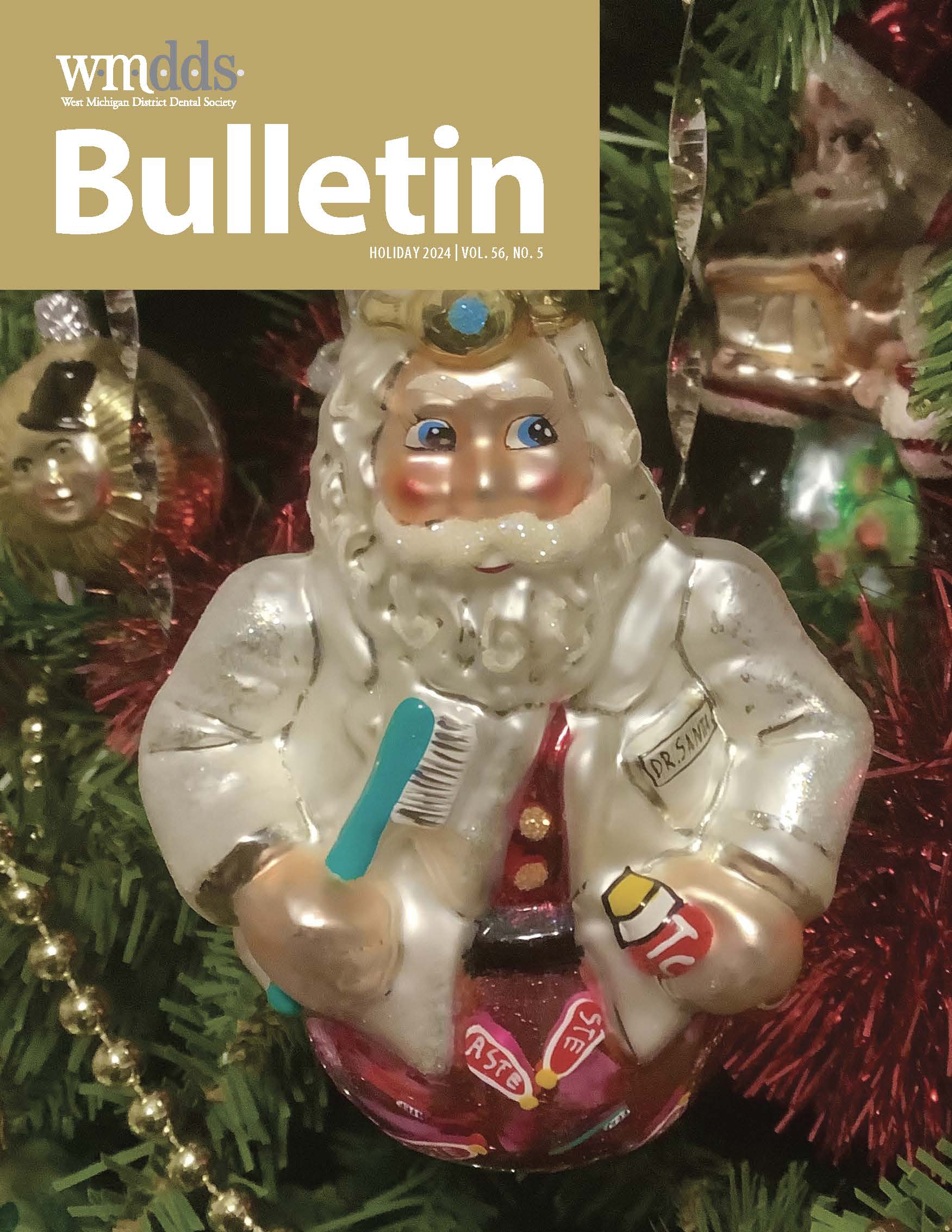 WMDDS Bulletin cover with image of a Christmas ornament hanging from a tree. The ornament is Santa Claus dressed as a dentist and holding a toothbrush and toothpaste.