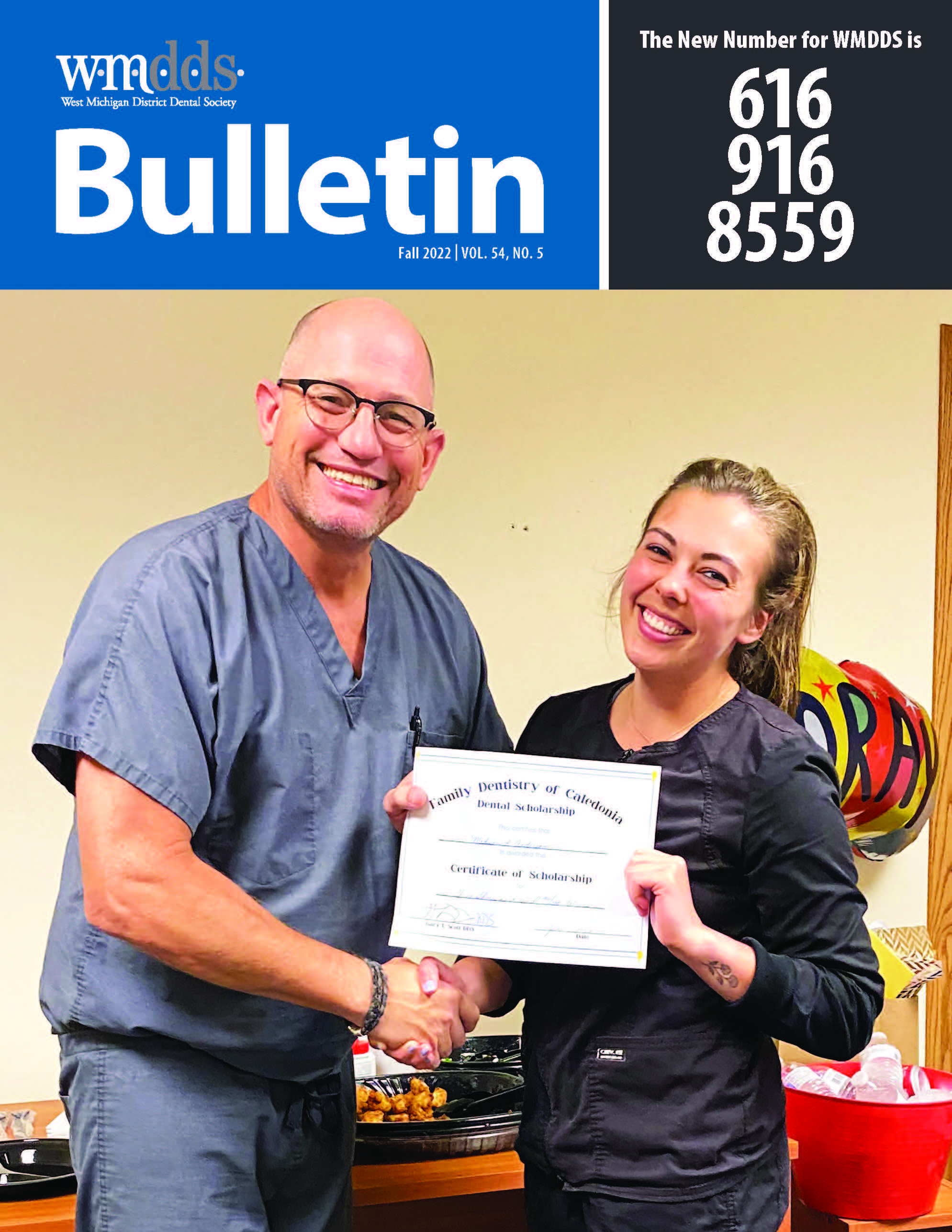 Cover of the WMDDS Bulletin featuring a photo of Dr. Gary Scott shaking hands with Madison Anderson. Madison is holding a certificate.