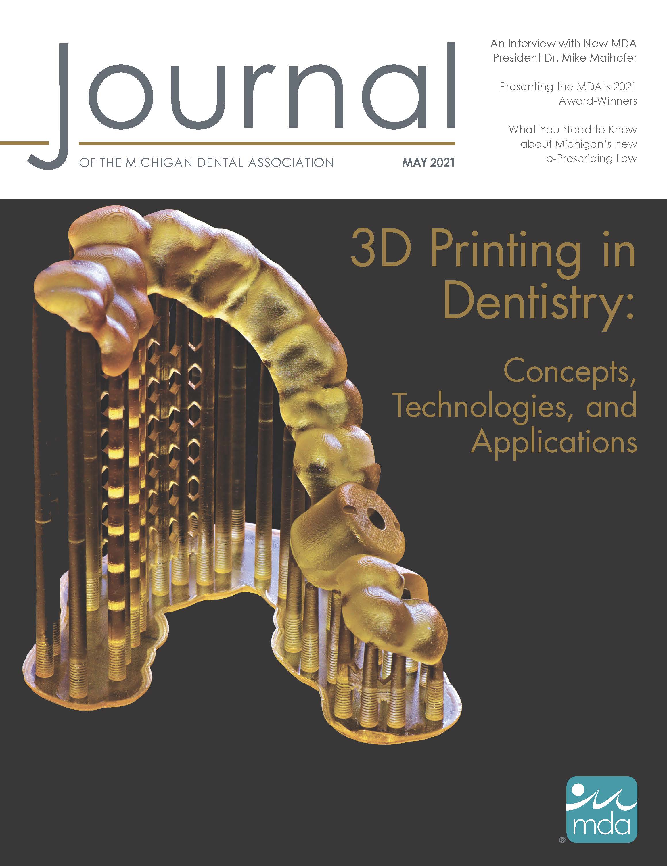 Cover of the Journal of the Michigan Dental Association with an image of an implant placement surgical pilot drill guide, post-cured and still on its printing platform raft.