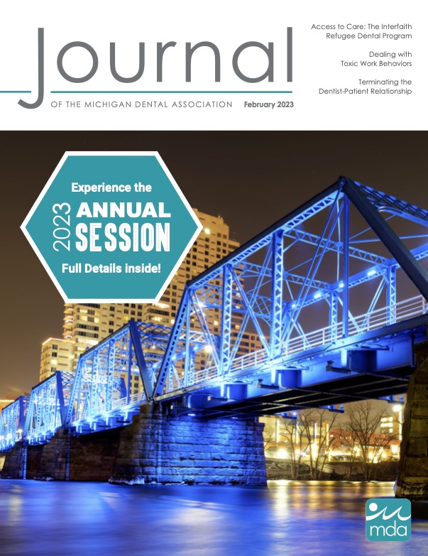 Cover of the Journal of the Michigan Dental Association featuring a metal truss bridge at night, lit up blue. There is a large icon overlaid on the cover that says Experience the 2023 annual session full details inside!